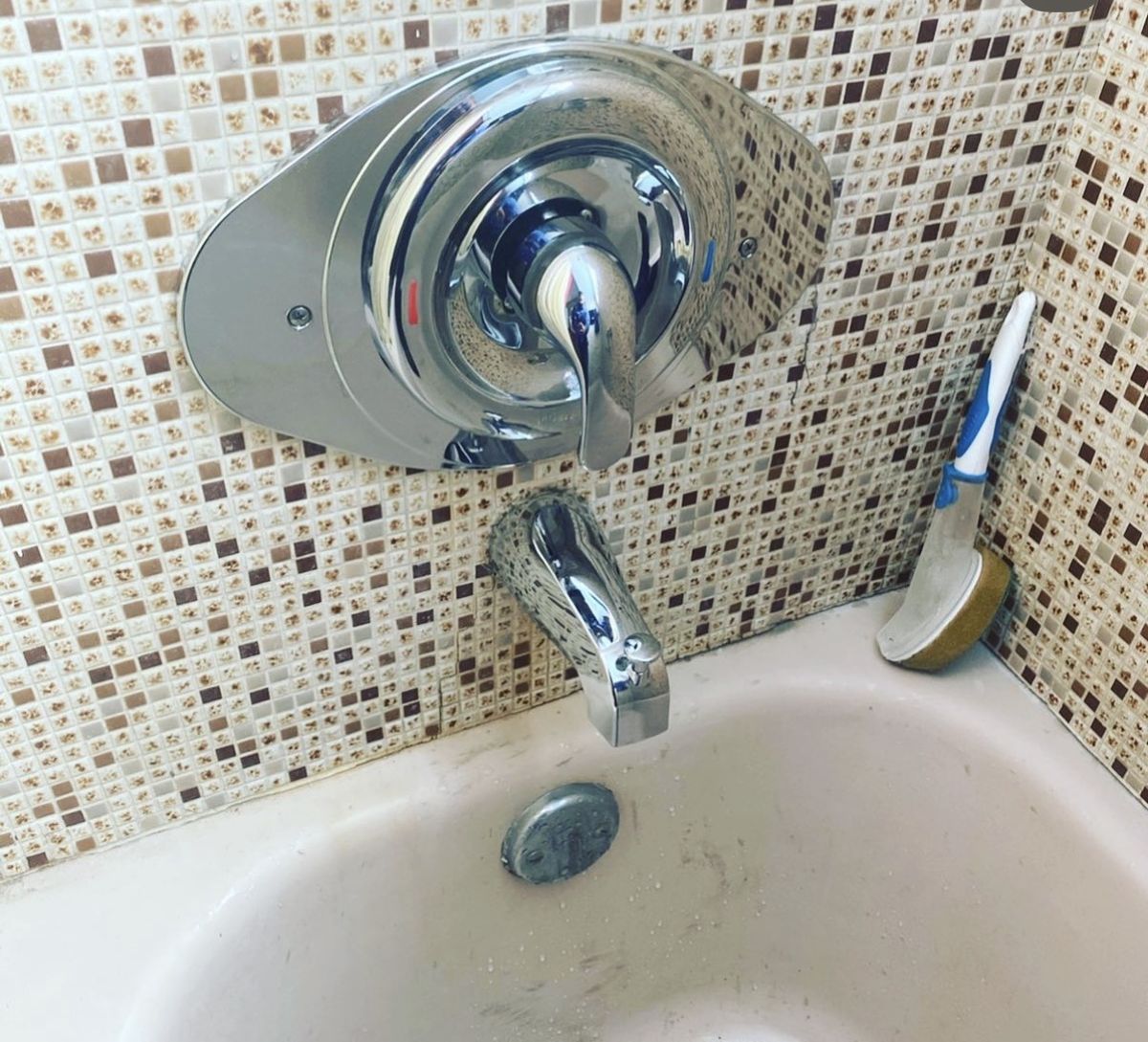 New chrome single-handle tub and shower valve with spout, installed by All-Time Plumbing